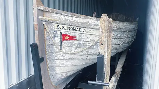 Un canot de sauvetage datant de l’époque du TITANIC stocké au sec et en toute sécurité.
         Le self stockage par TITAN Containers